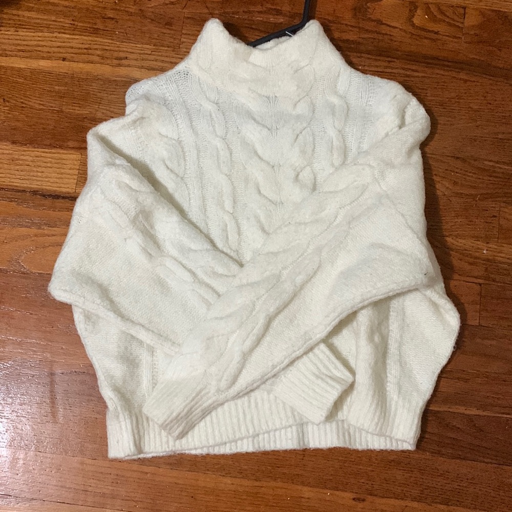 White turtleneck sweater